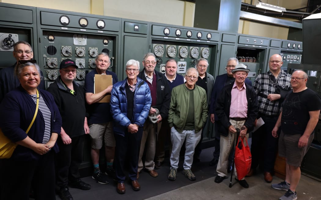 From L-R:  Adrian Sainsbury, RNZ Pacific Technical Specialist, Moera Tuilaepa-Taylor, Manager RNZ Pacific, Adam Claydon, NZ Radio DX League member, John Roberts, RNZ Studio Operator Senior Specialist, Master Control, Bryan Clark, NZ Radio DX League Vice President, Arthur de Maine, NZ Radio DX League President, Simon Hill, NZ Radio DX League member, Dene Lynneberg, NZ Radio DX League member, Chris Mackerell, NZ Radio DX League member, David Kaio, NZ Radio DX League member, Ray Babbage, NZ Radio DX League member, Michael Wilson, RNZ Senior Project Manager, Wayne Jarvis, RNZ Broadcast Technologist.