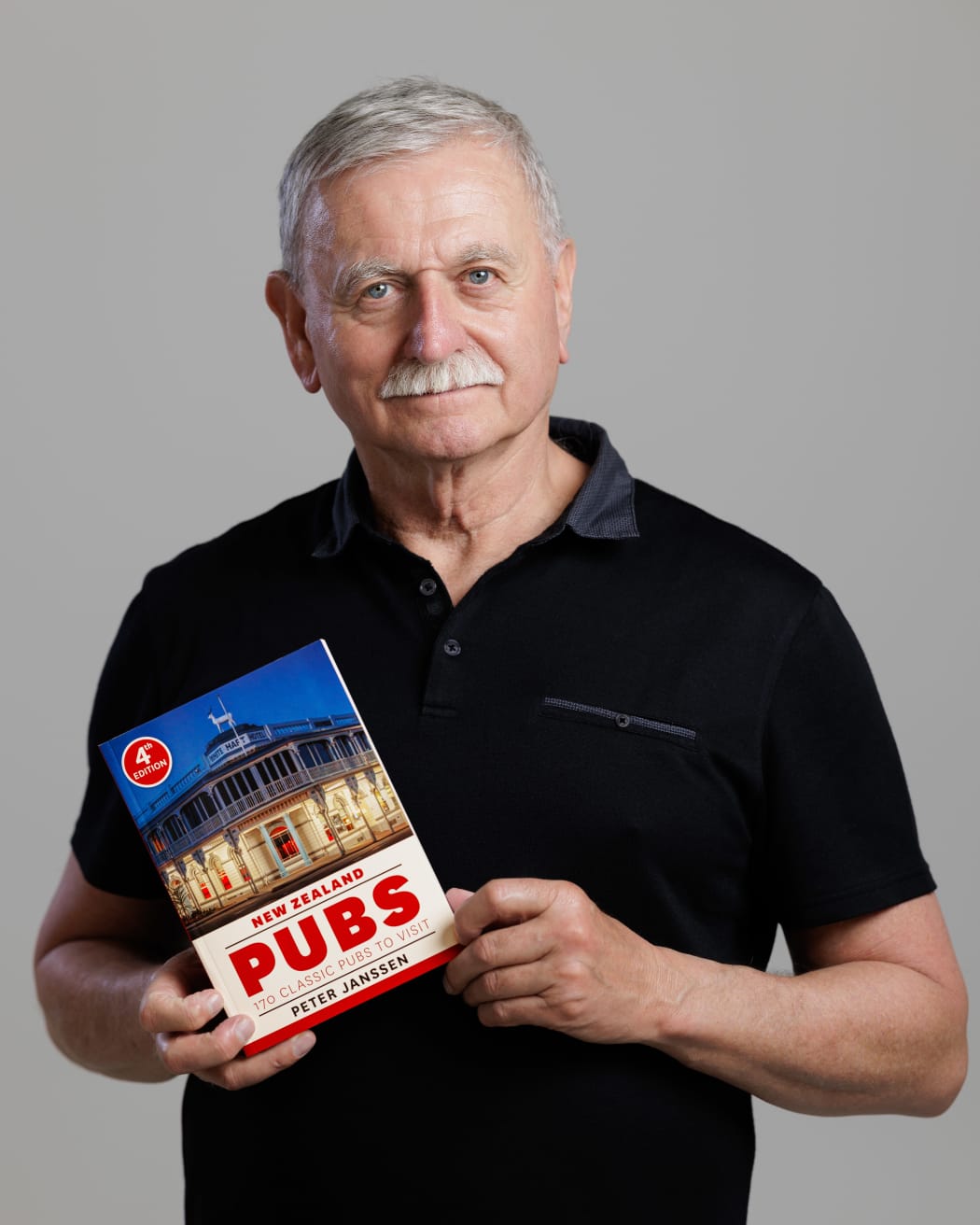 Peter Janssen with his new book, New Zealand Pubs.