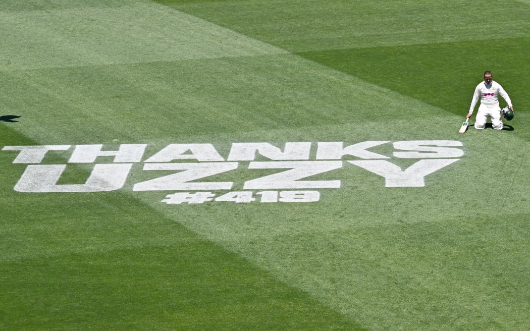 Australia’s Usman Khawaja bows down to the ground after his final Test during the last day of the fifth Ashes cricket Test between Australia and England at the Sydney Cricket Ground in Sydney on January 8, 2026. (Photo by Saeed KHAN / AFP) / -- IMAGE RESTRICTED TO EDITORIAL USE - STRICTLY NO COMMERCIAL USE --
