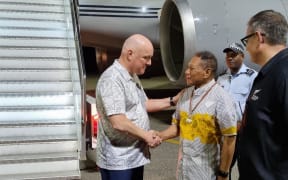 Christopher Luxon arrives in Honiara, greeted by Solomon Islands Foreign Affairs Minister Shanel Agovaka.