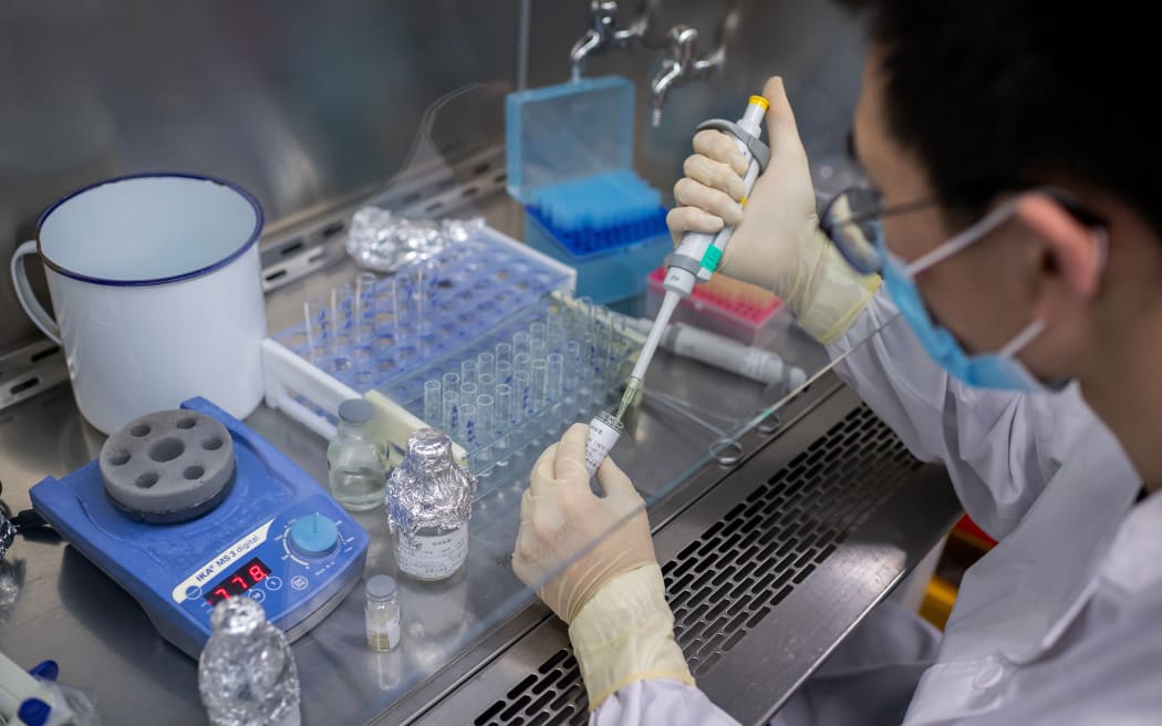 A laboratory worker at Sinovac Biotech in Beijing, one of four laboratories in China authorised to carry out clinical trials of a Covid-19 vaccine. 29 April 2020.