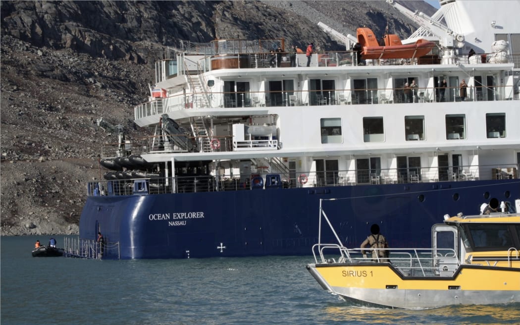 The cruise ship Ocean Explorer, operated by Australian company Aurora Expeditions, has been stuck in Alpefjord off Greenland's remote east coast since it ran aground on 11 September, 2023.