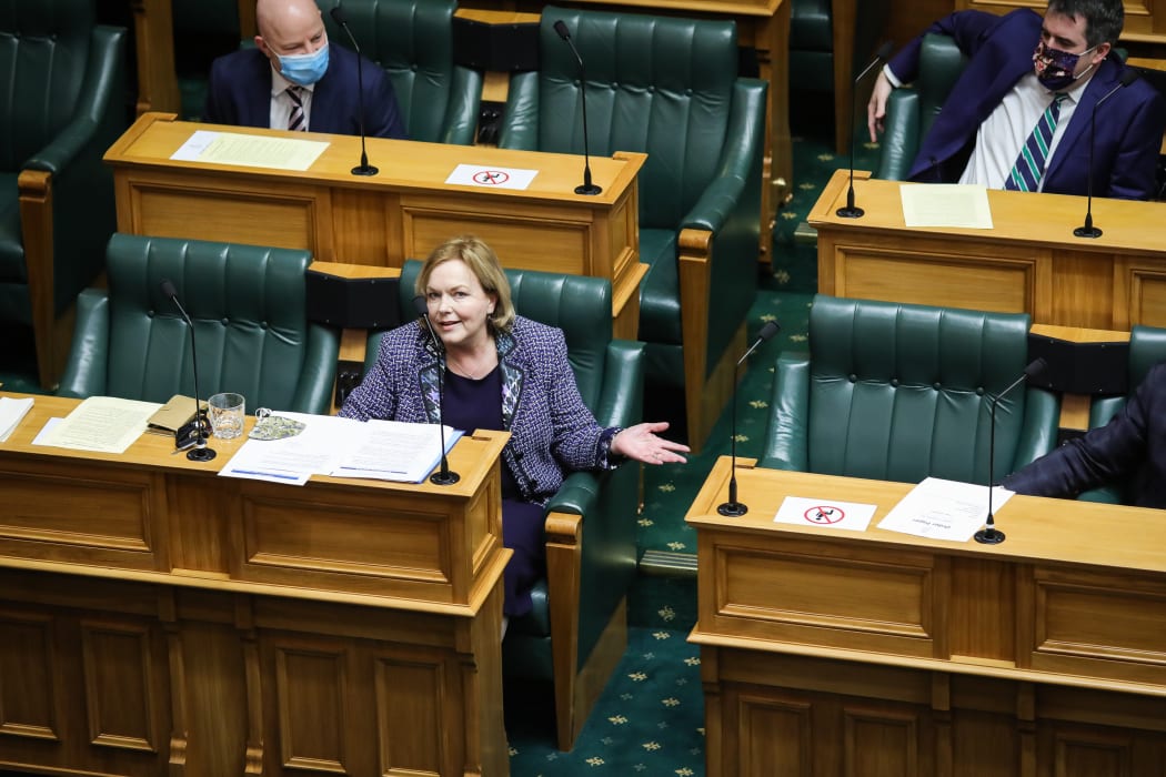 Judith Collins watched by colleagues