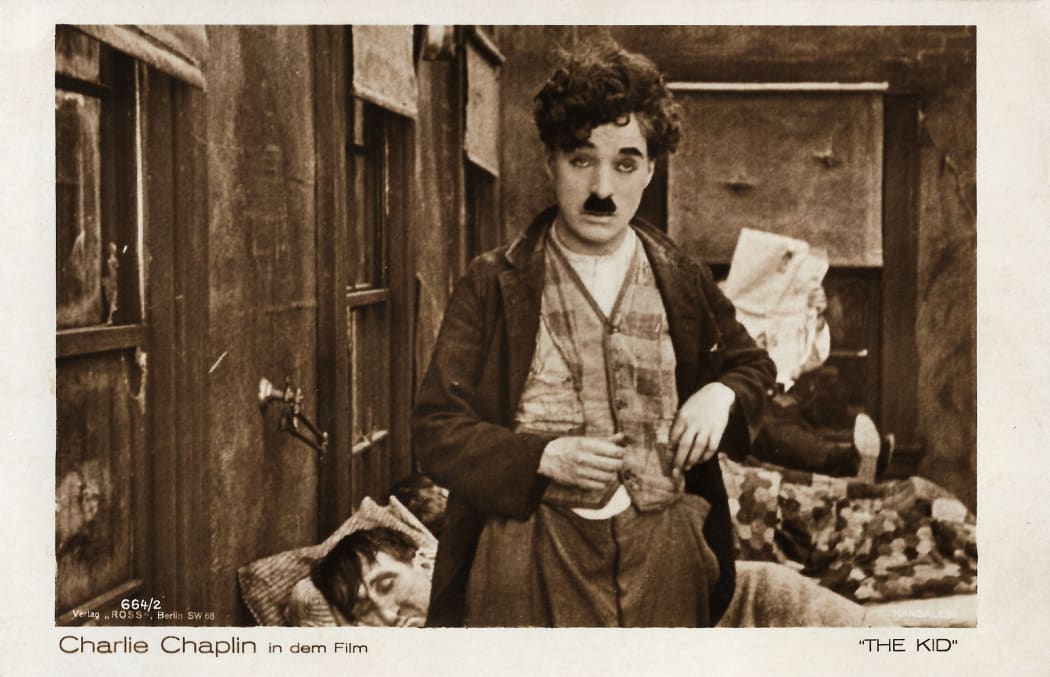 Postcard of Charlie Chaplin's film The Kid