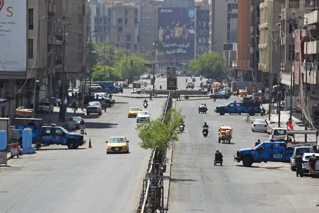 Iraqi security forces are deployed to enforce an extended curfew amid the Covid-19 pandemic in Baghdad, 8 June 2020.