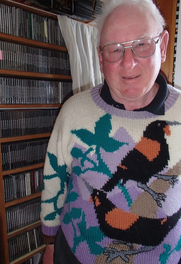 Sound recordist Les McPherson in front of his sound archive which contains thousands of bird calls.
