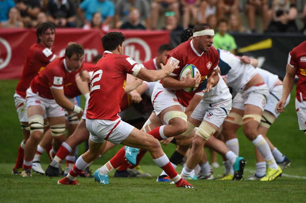 Canada launch a move off the back of a scrum against USA.