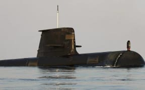 An Australian Navy Submarine transiting the Pacific visits Honiara briefly to obtain assistance for sick crew members. 14 June 2019