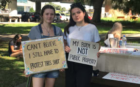 Katie Ashworth (left) and Stella Love Hart are marching against sexual harassment and assault.