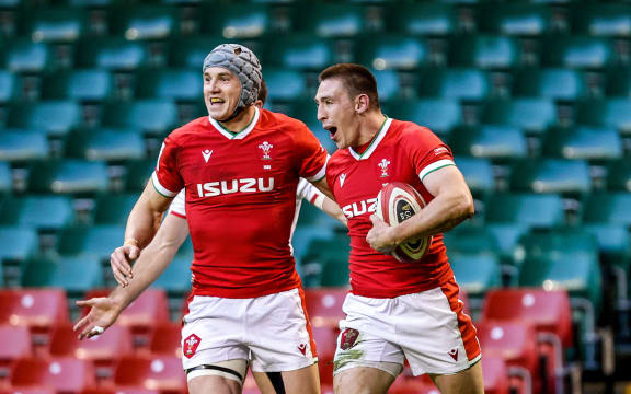 Wales' Jonathan Davies and Josh Adams.
