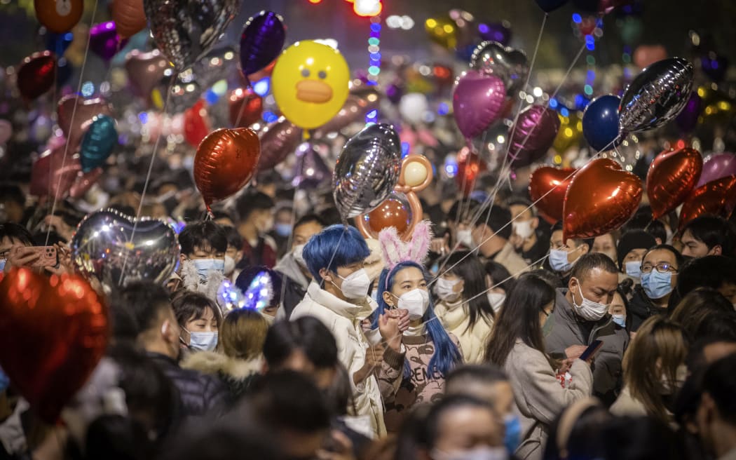 Revellers attending a New Year celebration in Wuhan, in China's central Hubei province. Taken on December 31, 2022.