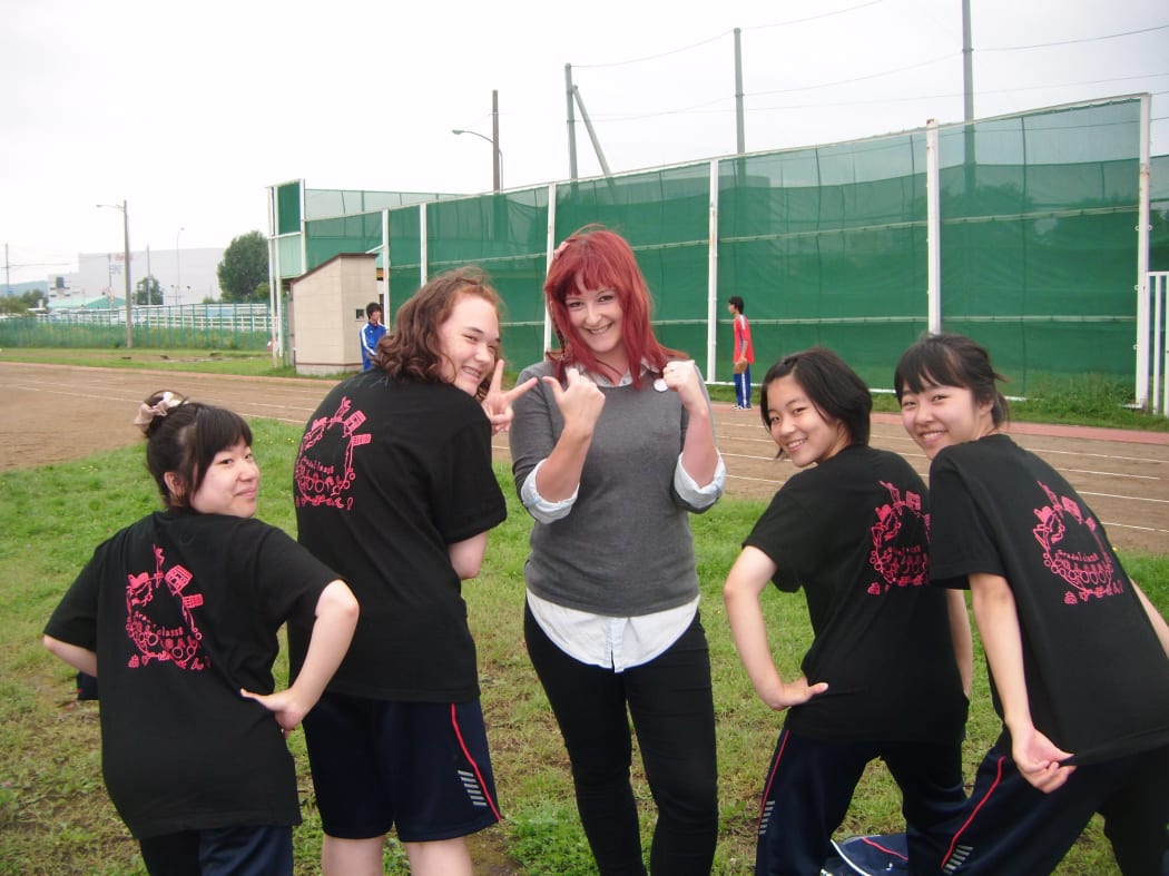 Scarlett with a group of students