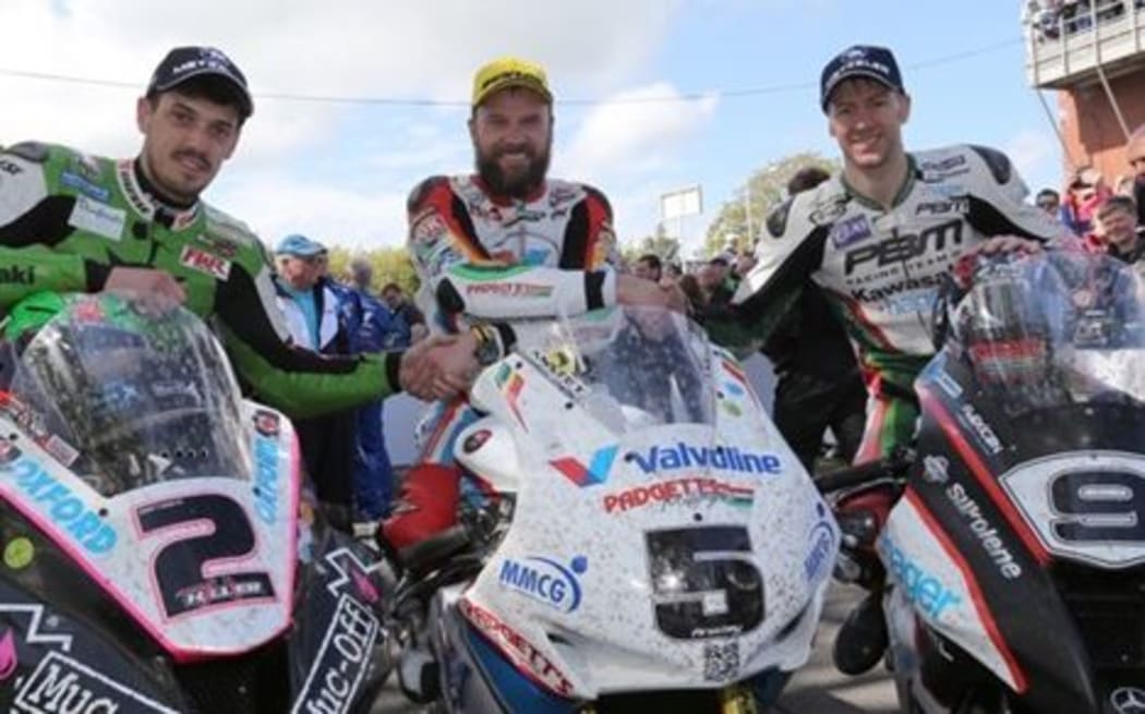New Zealand's Bruce Anstey (middle) after winning the Isle of Man TT.
