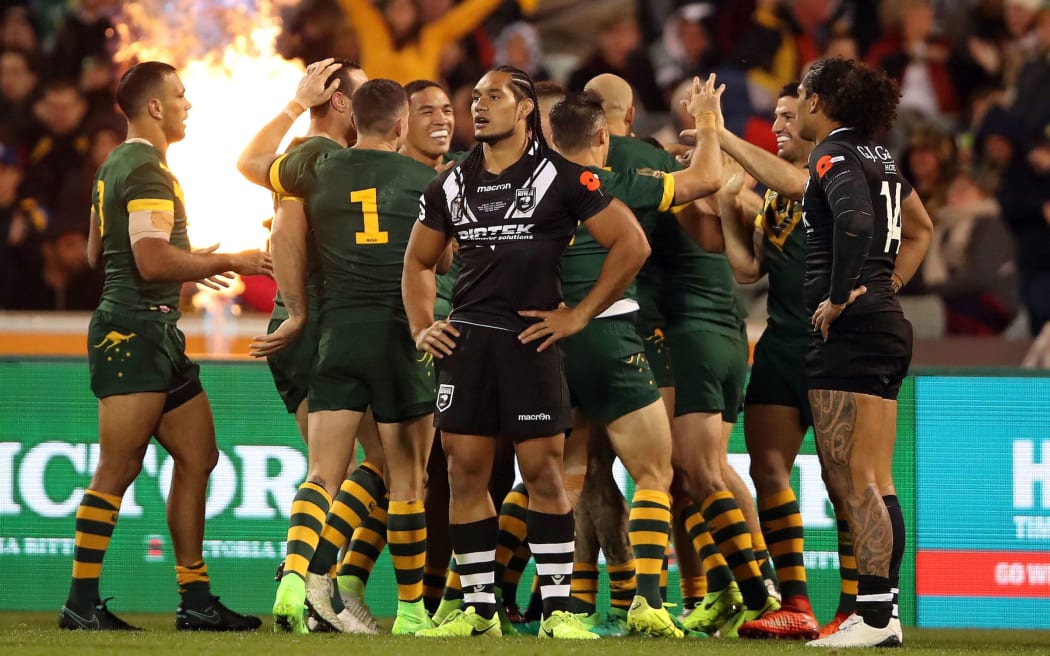 Martin Taupau looks dejected after yet another Kangaroos try.