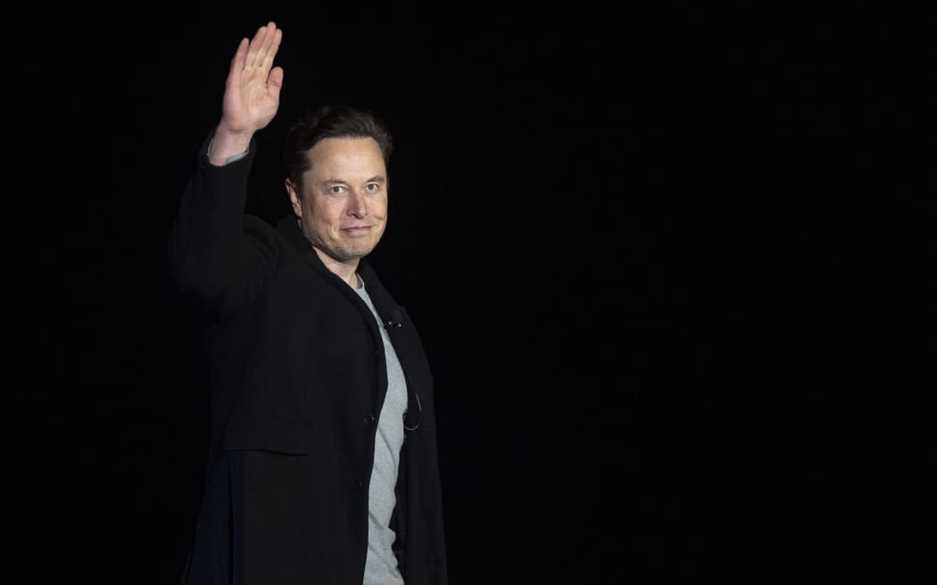 (FILES) In this file photo taken on February 10, 2022 Elon Musk gestures as he speaks during a press conference at SpaceX's Starbase facility near Boca Chica Village in South Texas. - Twitter suspended December 15, 2022, the accounts of more than a half-dozen journalists who had been writing about the company and its new owner Elon Musk. Some of the journalists had been tweeting about Twitter shutting down an @ElonJet account that tracked flights of the billionaire's private jet and about versions of that account hosted at other social networks. (Photo by JIM WATSON / AFP)