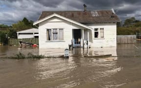 A flooded home in Edgecumbe