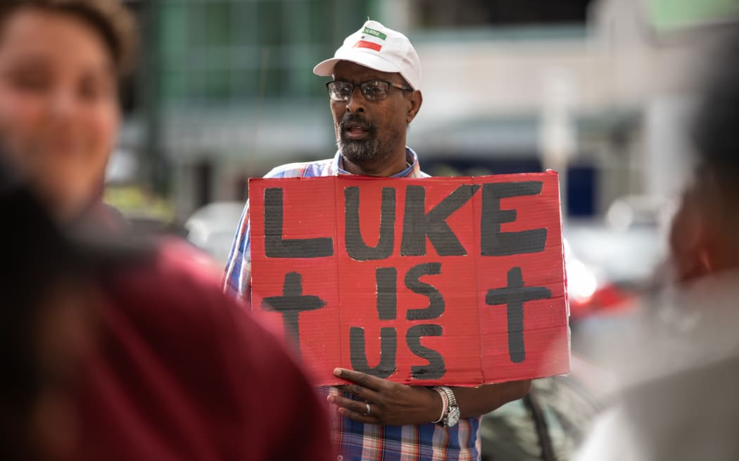 Signs for Luke Smith outside court