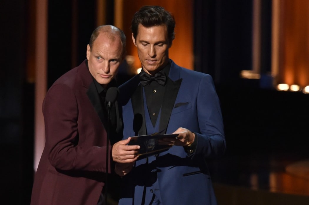 Actors Woody Harrelson (L) and Matthew McConaughey speak onstage at the 66th Annual Primetime Emmy Awards held at Nokia Theatre L.A. Live on August 25, 2014 in Los Angeles, California.