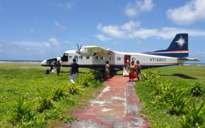 An Air Marshall Islands plane offloads passengers and cargo at Jaluit Atoll. Air Marshall Islands is one of 11 SOEs that are part of a major reform