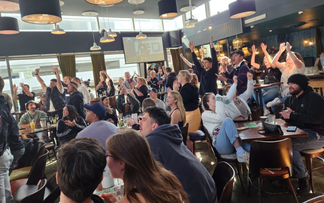 Celebrations at the Green Man Pub in Wellington as Beauden Barrett scores for the All Blacks during the final of the 2023 Rugby World Cup on 29 October, 2023.