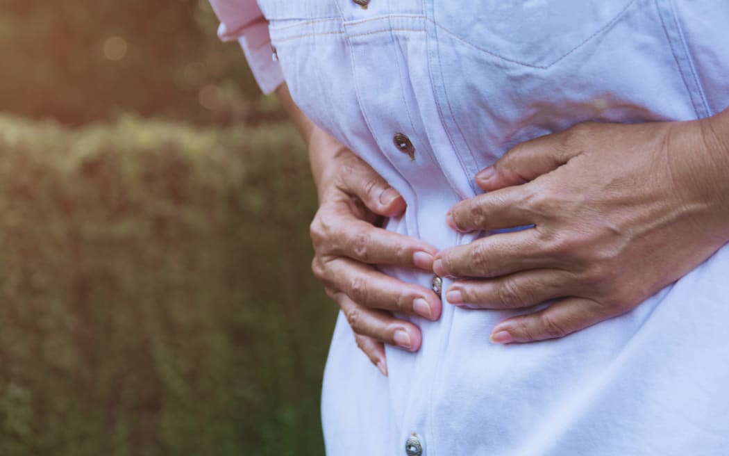 Endometrial cancer symptoms can include cramping and abnormal bleeding or spotting.