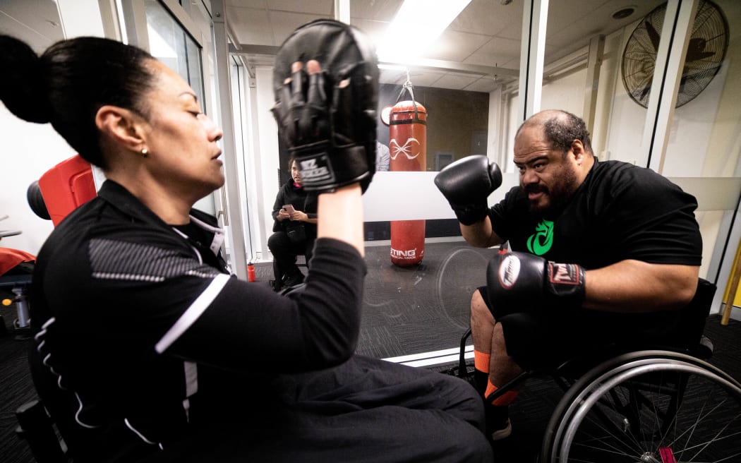 John Fiu training with coach AJ Pouoa at Jetts Gym.
