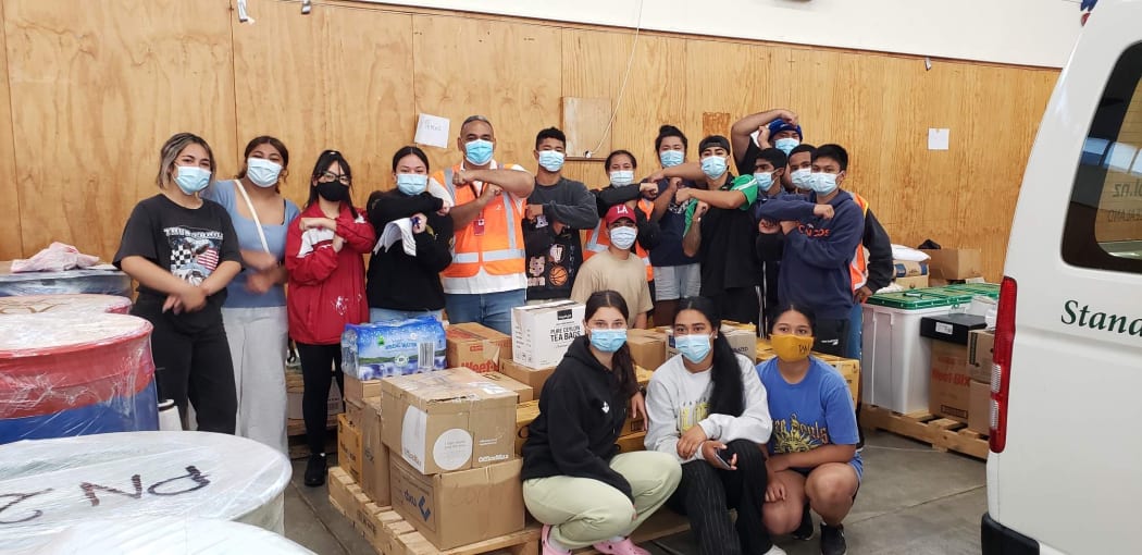 Goods are packed for Tonga by volunteers in Palmerston North.