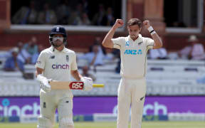 Tim Southee celebrates after watching Kyle Jamieson catch Ollie Robinson in NZ-England Test.