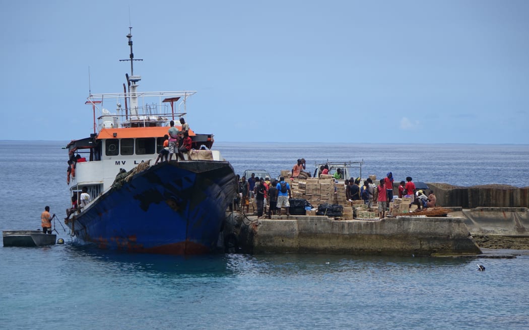 An inter-island ferry loads in the Vanuatu town of Lenakel, Tanna, for the return journey to the capital, Port Vila.