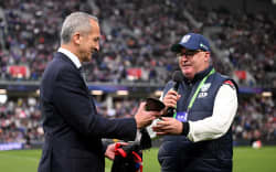 CHRISTCHURCH, NEW ZEALAND - JUNE 21: NRL CEO Andrew Abdo is presented with a Warriors jersey by Warriors CEO Cameron George ahead of the round 16 NRL match between New Zealand Warriors and North Queensland Cowboys at One NZ Stadium, on June 21, 2026, in Christchurch, New Zealand. (Photo by Joe Allison/Getty Images)