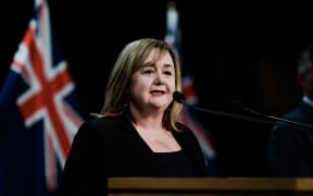 Housing Minister Megan Woods speaking at a media conference after an announcement that she would take charge of managed isolation and quarantine of returning New Zealanders, after a series of failures.