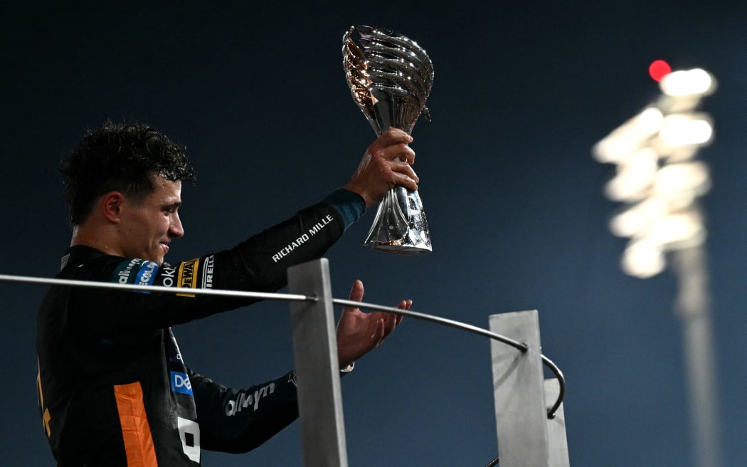 McLaren’s British driver Lando Norris celebrates F1 world title, 2025.