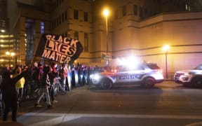 Black Lives Matter activists confront Columbus Police outside of Columbus Police headquarters during a protest in reaction to the shooting of Makiyah Bryant.