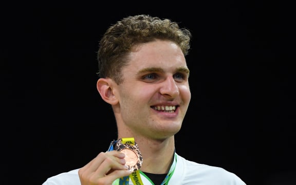 Bronze medallist New Zealand's Lewis Clareburt poses during the medal presentation ceremony for the men's 200m individual medley swimming final at the Sandwell Aquatics Centre, on day six of the Commonwealth Games in Birmingham, central England, on 3 August, 2022.