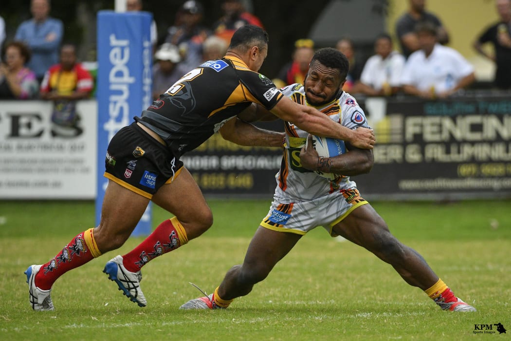 Jokadi Bire playing against the Sunshine Coast Falcons.