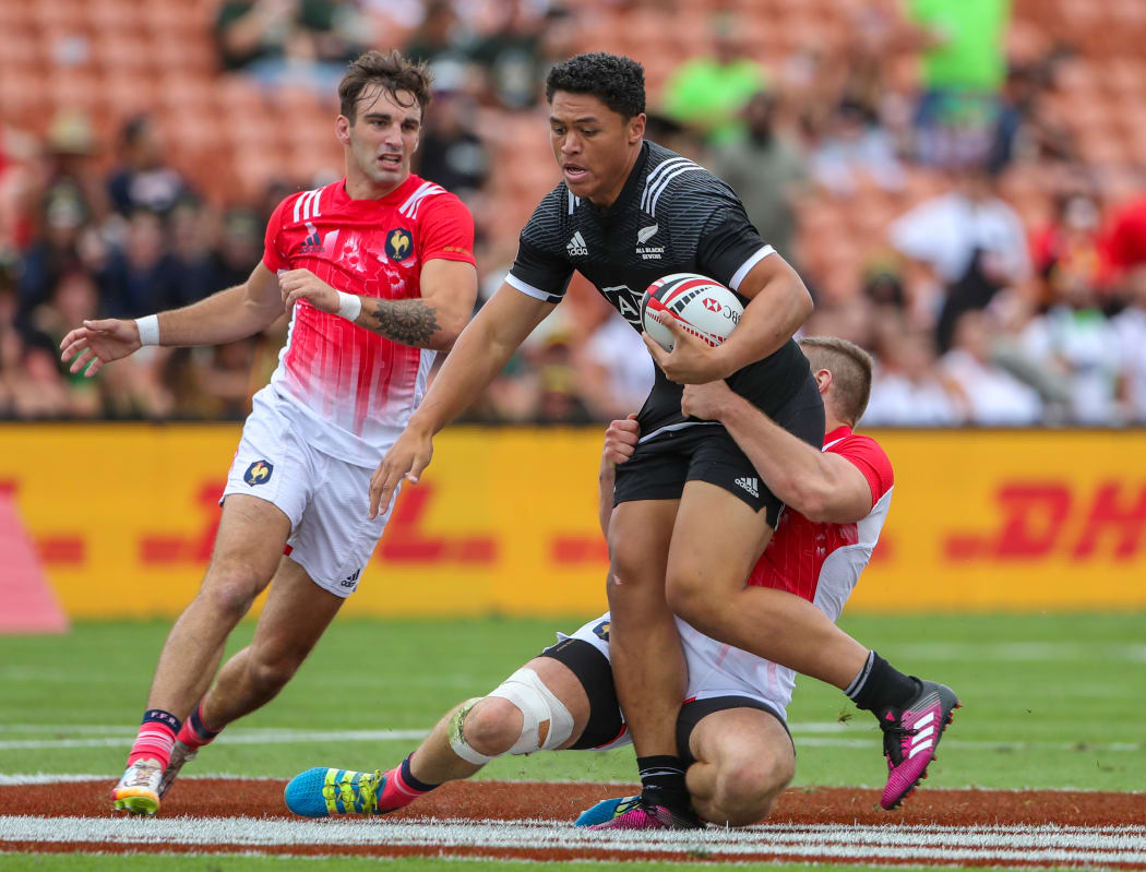 Caleb Clarke heads for the line against France