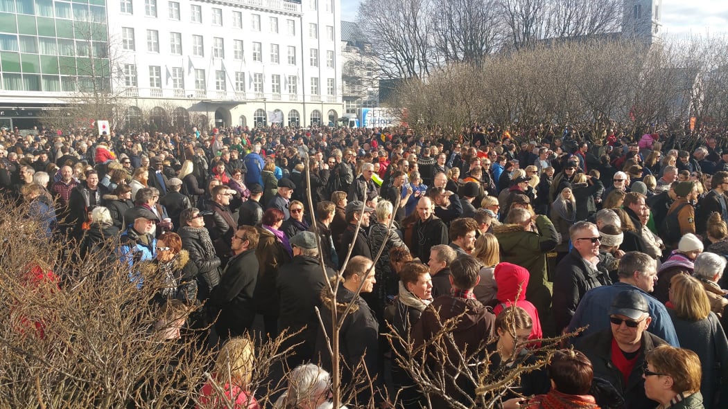 People gather in Reykjavik on Monday to demand the resignation of the Prime Minister of Iceland over revelations in the so-called Panama Papers.