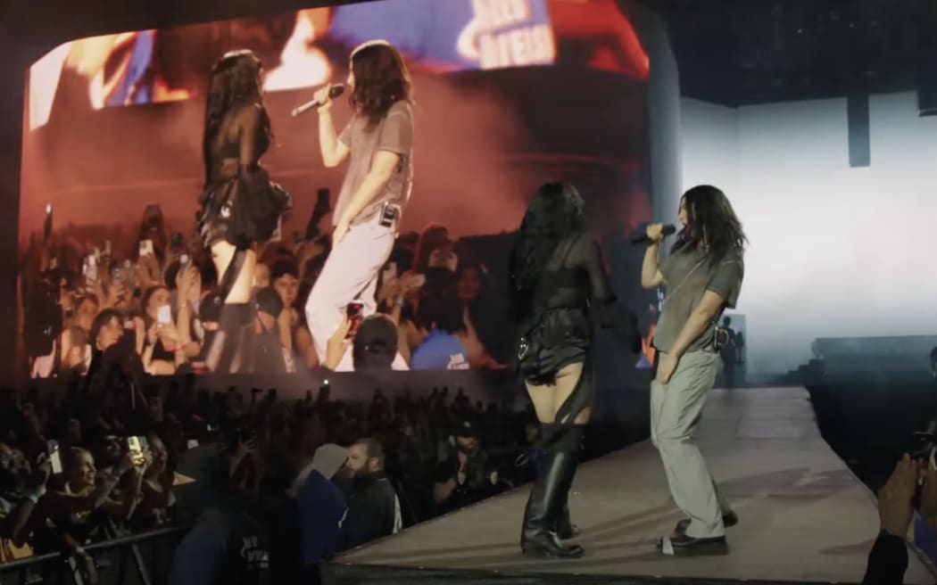 Lorde performs with Charli XCX at Coachella 2025.