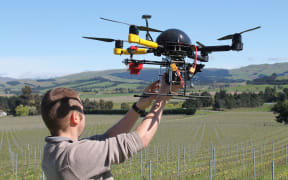 Rob Prileszky prepares to fly the quadcopter