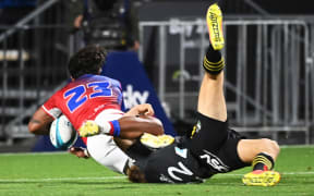 Moana Pasifika player Danny Toala score the winning try in golden point time during their Super Rugby match