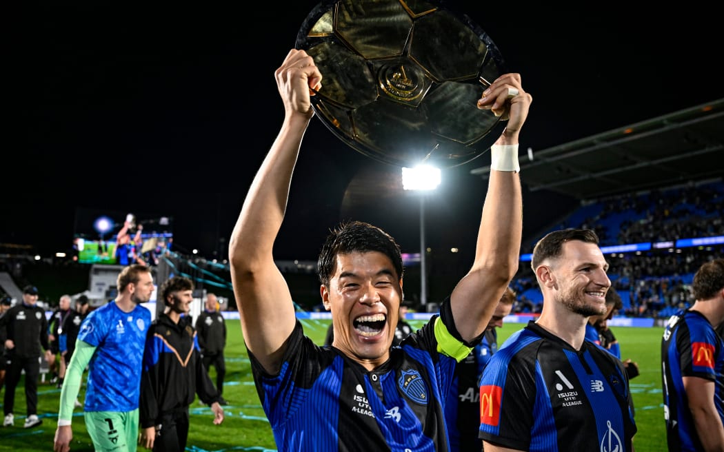 Hiroki Sakai of Auckland FC celebrates with the A-League Premier Plate