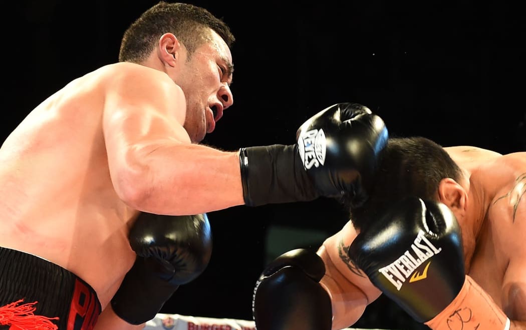 New Zealand heavyweight Joseph Parker knocks out Australian Bowie Tupou in the first round of their fight.