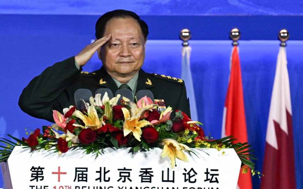 China's Vice Chairman of the Central Military comission Zhang Youxia salutes as he attends the Xiangshan Forum in Beijing on October 30, 2023. Beijing says representatives of 90 countries are taking part in this week's Xiangshan Forum, a gathering of military and diplomatic officials billed as its answer to the annual Shangri-La Dialogue in Singapore. (Photo by Pedro PARDO / AFP) / “The erroneous mention[s] appearing in the metadata of this photo by Pedro PARDO has been modified in AFP systems in the following manner: [correcting name to Zhang Youxia] instead of [Zhang Youxian]. Please immediately remove the erroneous mention[s] from all your online services and delete it (them) from your servers. If you have been authorized by AFP to distribute it (them) to third parties, please ensure that the same actions are carried out by them. Failure to promptly comply with these instructions will entail liability on your part for any continued or post notification usage. Therefore we thank you very much for all...