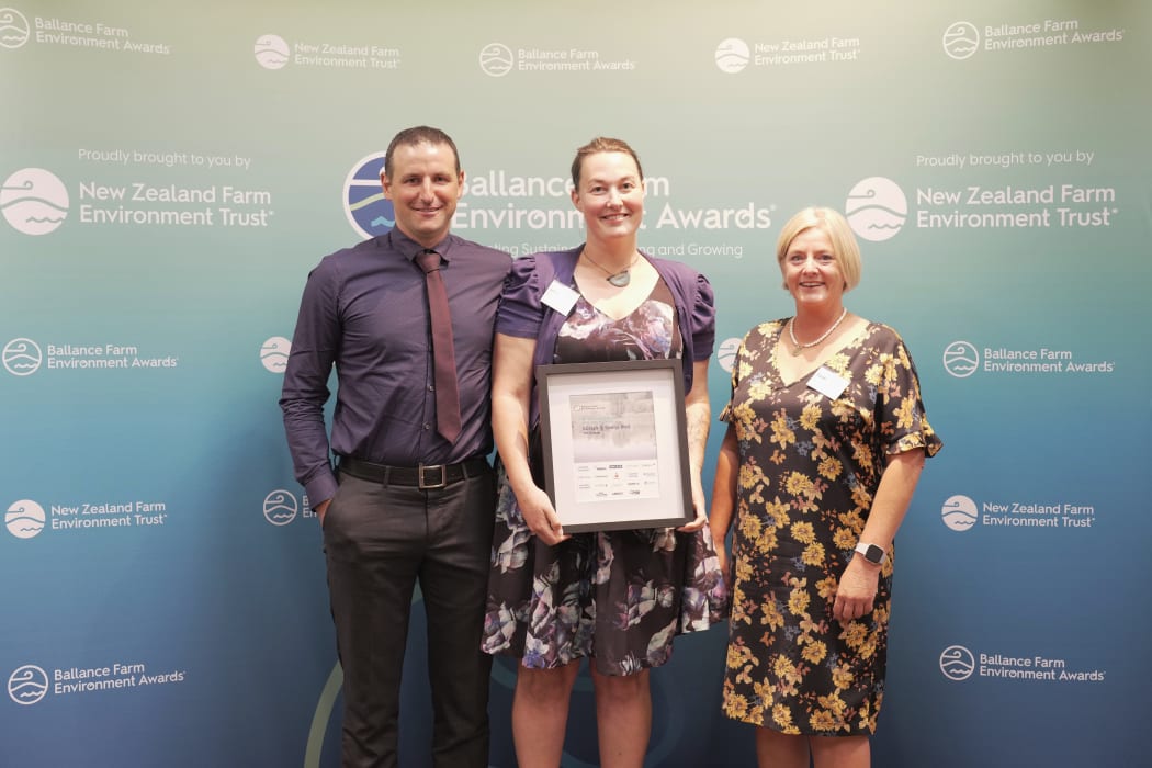 Alistair and Genna at the awards with NZ Farm Environment Trust General Manager Sarah Harris