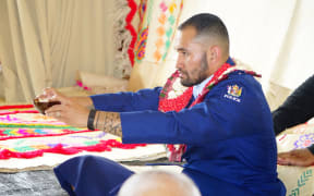 Sergeant Sanalio Kaihau drinks a bowl of kava at a ceremony for his appointment as police Pacific Liason Coordinator for Auckland's Waitematā district.