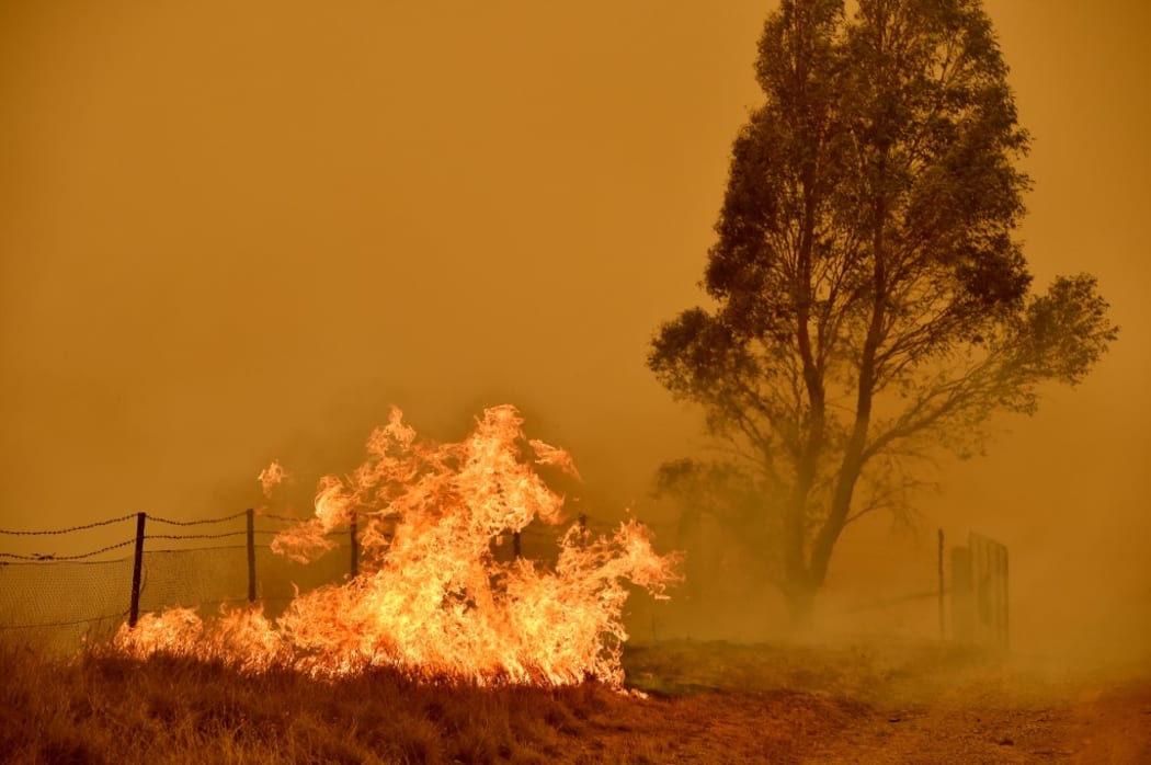 Bushfires burn near the town of Bumbalong south of Canberra on February 1, 2020.