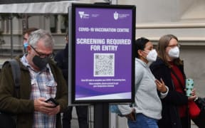 People arrive at a vaccination centre in Melbourne on May 27, 2021 after five million people in Melbourne were ordered into a snap week-long lockdown following another Covid-19 virus outbreak.