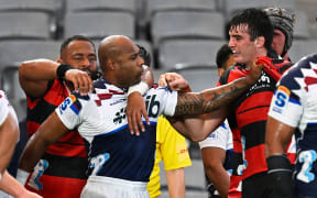Mark Tele’a and Jamie Hannah in a scuffle during the Blues and Crusaders Super Rugby Pacific clash at Eden Park.