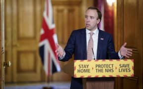 A handout image released by 10 Downing Street, shows Britain's Health Secretary Matt Hancock attending a remote press conference to update the nation on the COVID-19 pandemic, inside 10 Downing Street in central London on April 21, 2020.