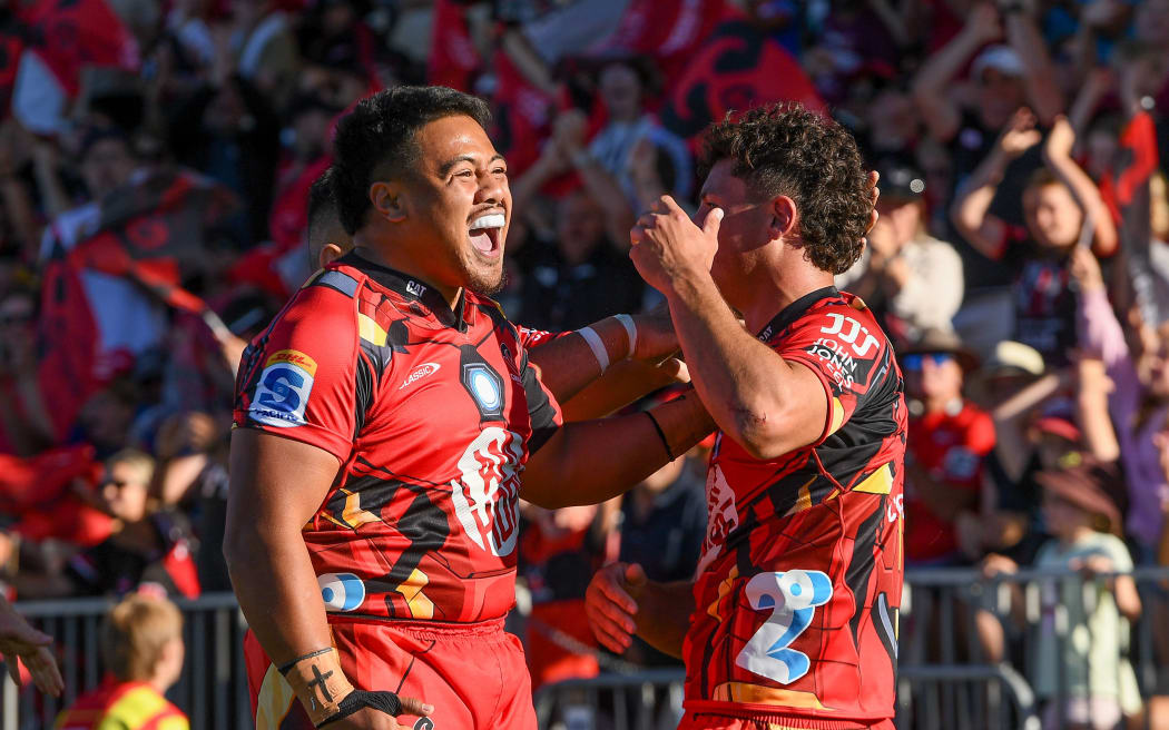 Ioane Moananu and Macca Springer of the Crusaders celebrate.